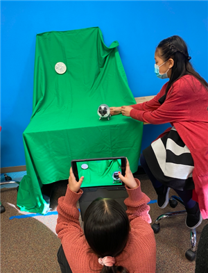 Students film green screen videos